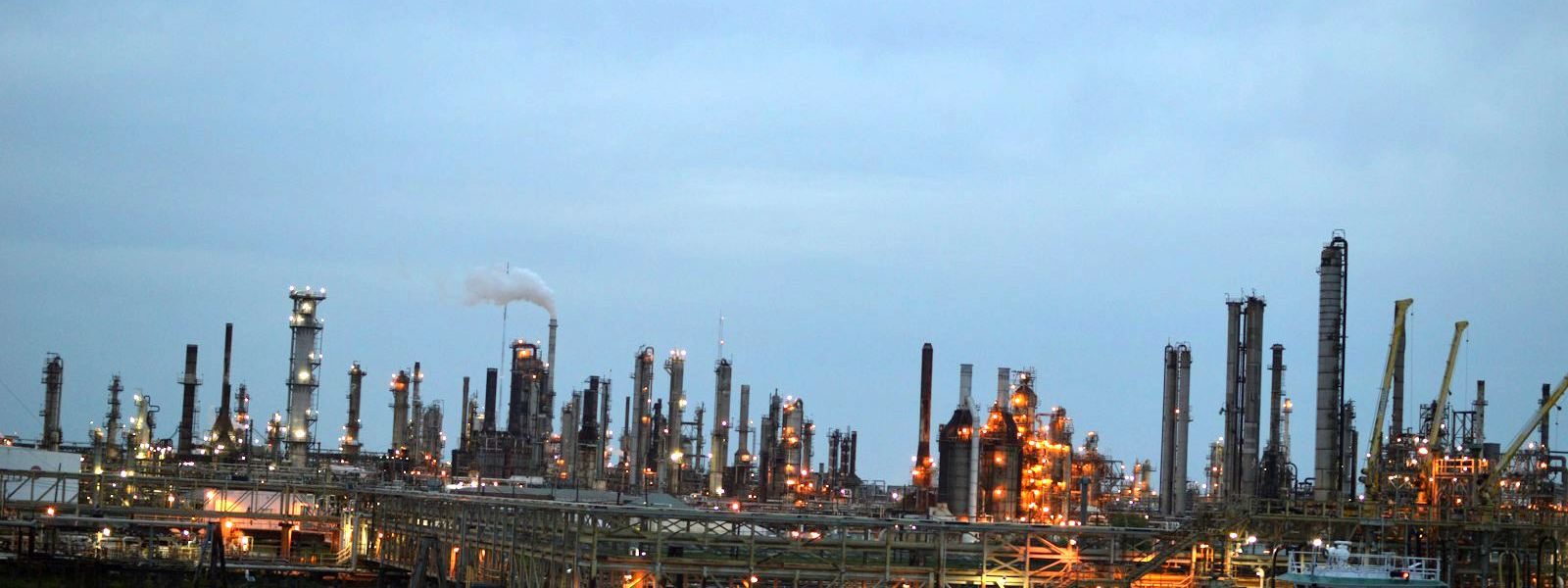CoreTech Sourcing Refinery Complex at Dusk.